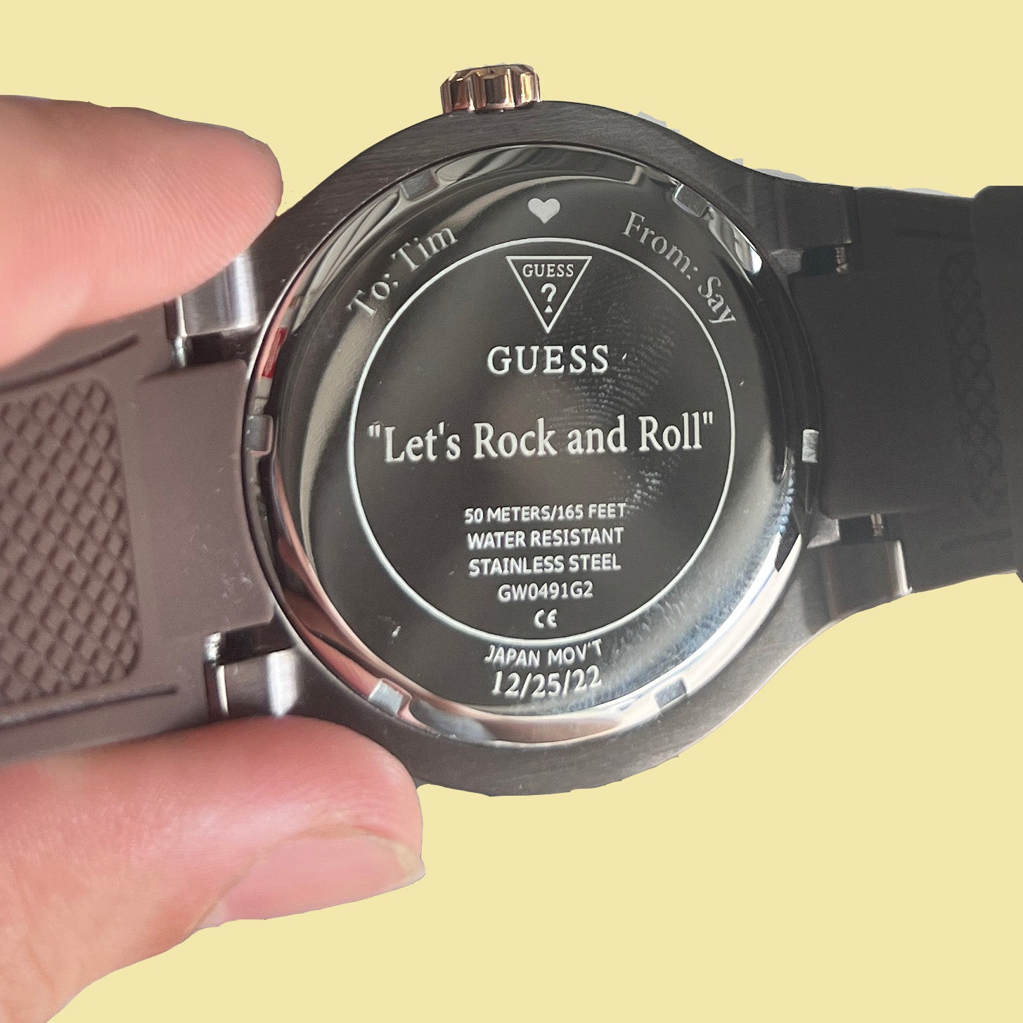 guess watch engraved with names and phrase "Let's Rock and Roll"