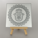 Engraved glass mirror with a detailed hamsa and mandala design