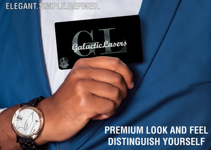 Man with watch and suit holding a GalacticLasers business card. Elevate Your Brand: Luxurious Metal Business Cards 1.25mm thick black anodized aluminum - GalacticLasers