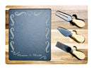 Charcuterie board with Carmen and Keith script names and flourish border engraved into the slate