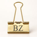 Gold money clip laser engraved with the initials BZ